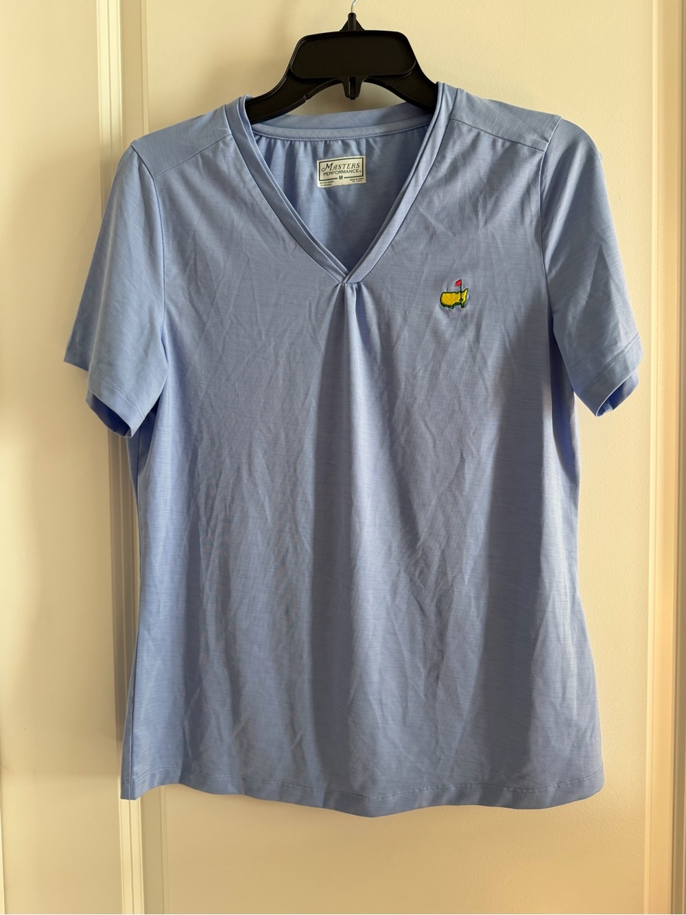 Masters Women's Light Blue V-Neck Short Sleeve Golf Tee with Embroidered Logo